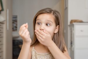 child with knocked out tooth